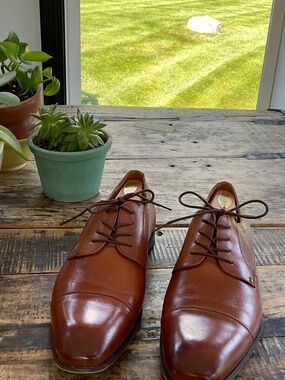 Florsheim men’s tan shoe,12 D.